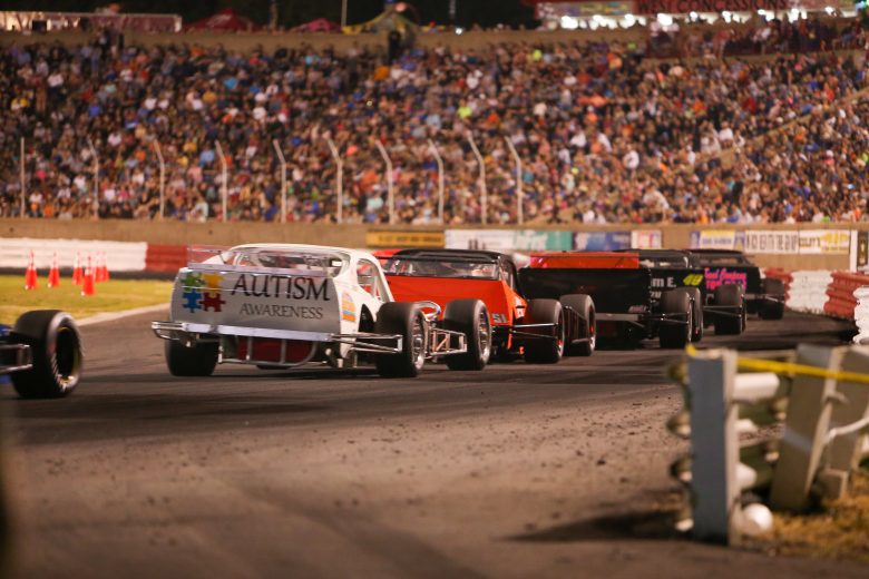 Drivers battle for position during the Hayes Jewelers 200 at Bowman Gray Stadium in Winston-Salem, North Carolina, on April 23, 2022. (Adam Fenwick/NASCAR)
