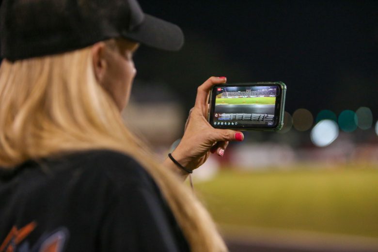 A fan watches during the Hayes Jewelers 200 at Bowman Gray Stadium in Winston-Salem, North Carolina, on April 23, 2022. (Adam Fenwick/NASCAR)