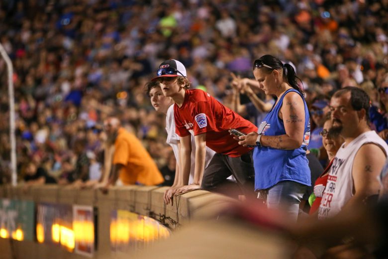 A fan watches during the Hayes Jewelers 200 at Bowman Gray Stadium in Winston-Salem, North Carolina, on April 23, 2022. (Adam Fenwick/NASCAR)