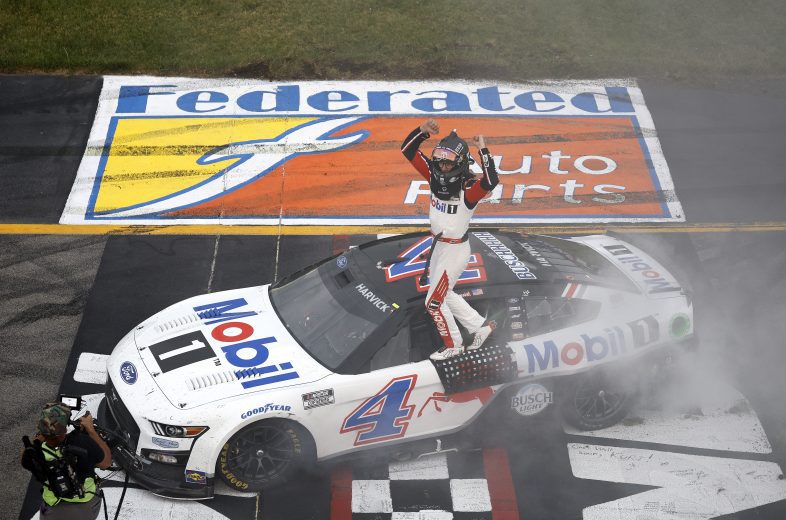 RICHMOND, VIRGINIA - AUGUST 14: Kevin Harvick, driver of the #4 Mobil 1 Ford, celebrates after winning the NASCAR Cup Series Federated Auto Parts 400 at Richmond Raceway on August 14, 2022 in Richmond, Virginia.