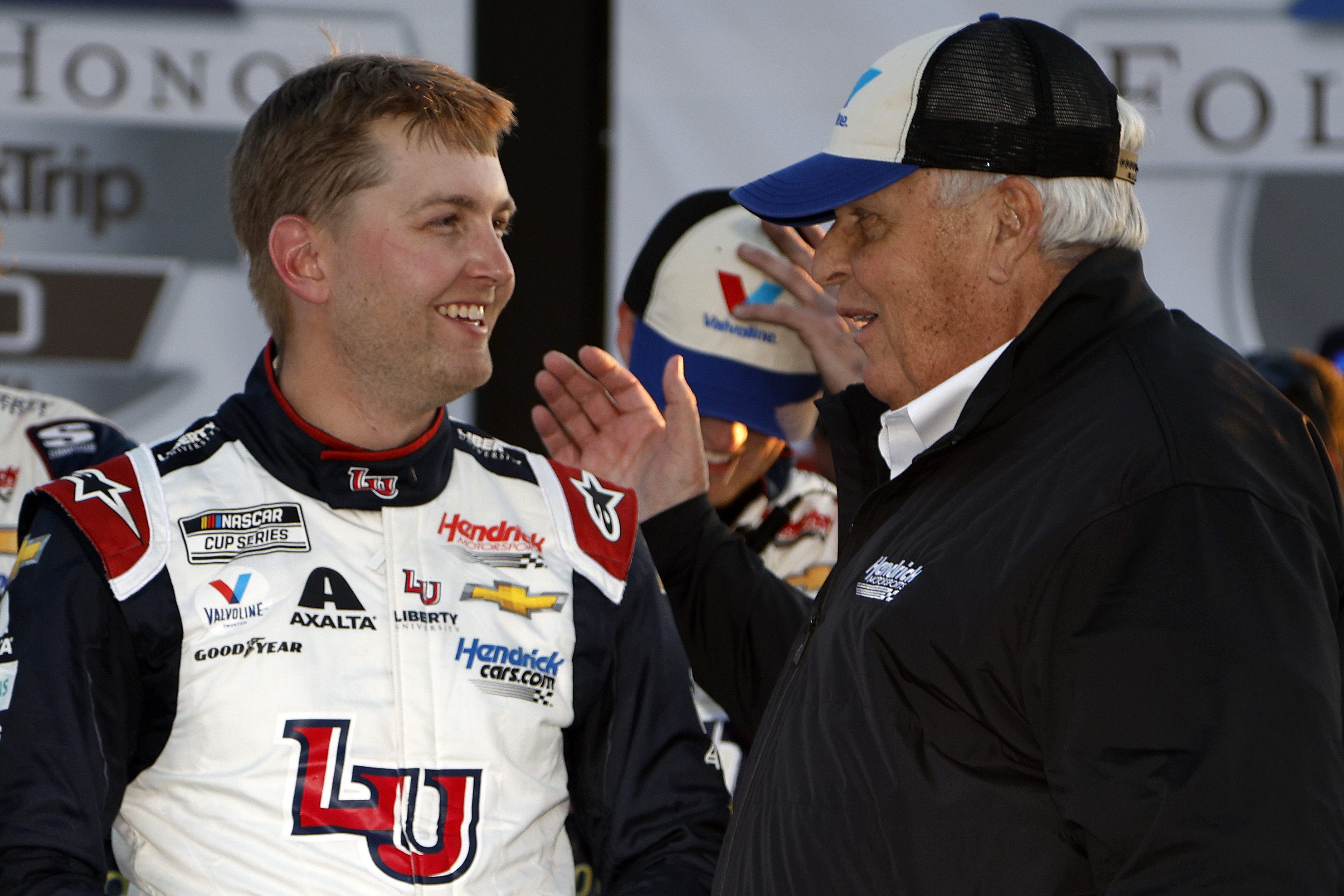 HAMPTON, GEORGIA - MARCH 20: William Byron, driver of the #24 Liberty University Chevrolet, is congratulated by Hendrick Motorsports owner Rick Hendrick in victory lane after winning the NASCAR Cup Series Folds of Honor QuikTrip 500 at Atlanta Motor Speedway on March 20, 2022 in Hampton, Georgia. (Photo by Sean Gardner/Getty Images) | Getty Images