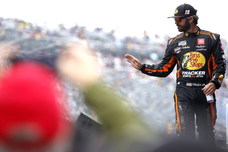 DOVER, DELAWARE - MAY 01: Martin Truex Jr., driver of the #19 Bass Pro Shops Toyota, waves to fans during the driver intros prior to the NASCAR Cup Series DuraMAX Drydene 400 presented by RelaDyne at Dover Motor Speedway on May 01, 2022 in Dover, Delaware. (Photo by Sean Gardner/Getty Images) | Getty Images