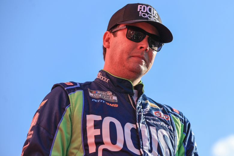 CONCORD, NORTH CAROLINA - MAY 29: Erik Jones, driver of the #43 FOCUSfactor Chevrolet, walks onstage during driver intros prior to the NASCAR Cup Series Coca-Cola 600 at Charlotte Motor Speedway on May 29, 2022 in Concord, North Carolina. (Photo by Buda Mendes/Getty Images) | Getty Images