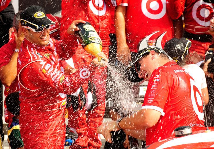 WATKINS GLEN, NY - AUGUST 08:  Juan Pablo Montoya (L), driver of the #42 Target Chevrolet, celebrates after winning the NASCAR Sprint Cup Series Heluva Good! Sour Cream Dips at Watkins Glen International on August 8, 2010 in Watkins Glen, New York.  (Photo by Rusty Jarrett/Getty Images for NASCAR) | Getty Images