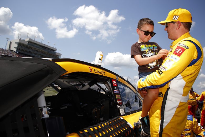 LEBANON, TENNESSEE - JUNE 20: Kyle Busch, driver of the #18 Pedigree Toyota, spend time with his son Brexton on the grid prior to the NASCAR Cup Series Ally 400 at Nashville Superspeedway on June 20, 2021 in Lebanon, Tennessee. (Photo by Jared C. Tilton/Getty Images) | Getty Images