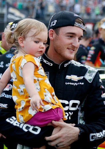 BRISTOL, TN - AUGUST 17: Ty Dillon, Germain Racing, Chevrolet Camaro GEICO Military (13) with daughter Oakley during the running of the 59th annual Bass Pro Shops NRA Night Race on August 17, 2019 at Bristol Motor Speedway in Bristol, TN. (Photo by Jeff Robinson/Icon Sportswire via Getty Images)