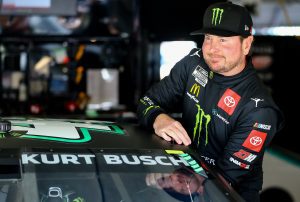 HAMPTON, GEORGIA - MARCH 19: Kurt Busch, driver of the #45 Monster Energy Toyota, enters his car in the garage area during practice for the NASCAR Cup Series Folds of Honor QuikTrip 500 at Atlanta Motor Speedway on March 19, 2022 in Hampton, Georgia. (Photo by Mike Mulholland/Getty Images) | Getty Images