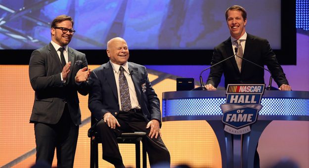 Bruton Smith smiles with Marcus Smith and Brad Keselowski