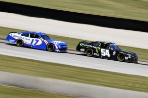 ELKHART LAKE, WISCONSIN - JULY 02: Ty Gibbs, driver of the #54 Monster Energy Toyota, and Kyle Larson, driver of the #17 Hendrickcars.com Chevrolet, race during the NASCAR Xfinity Series Henry 180 at Road America on July 02, 2022 in Elkhart Lake, Wisconsin. (Photo by Logan Riely/Getty Images) | Getty Images