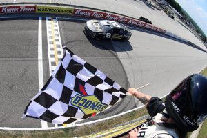 ELKHART LAKE, WISCONSIN - JULY 03: Tyler Reddick, driver of the #8 3CHI Chevrolet, takes the checkered flag to win the NASCAR Cup Series Kwik Trip 250 at Road America on July 03, 2022 in Elkhart Lake, Wisconsin. (Photo by Logan Riely/Getty Images) | Getty Images