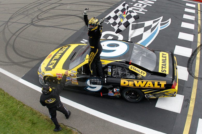 Marcos Ambrose celebrated his 2011 win at Watkins Glen