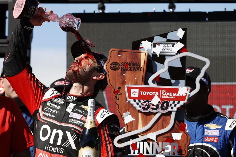 Daniel Suarez celebrates in Victory Lane at Sonoma