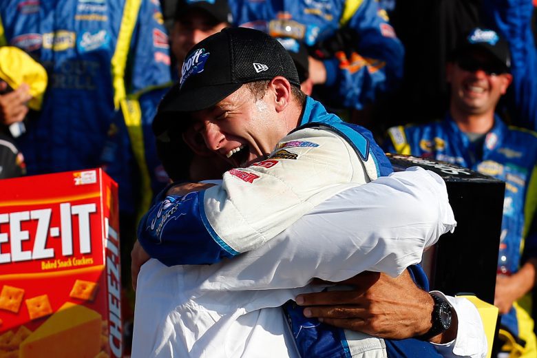 AJ Allmendinger hugs team owner Brad Daugherty