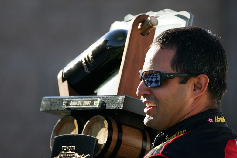 Juan Pablo Montoya celebrates in Victory Lane at Sonoma