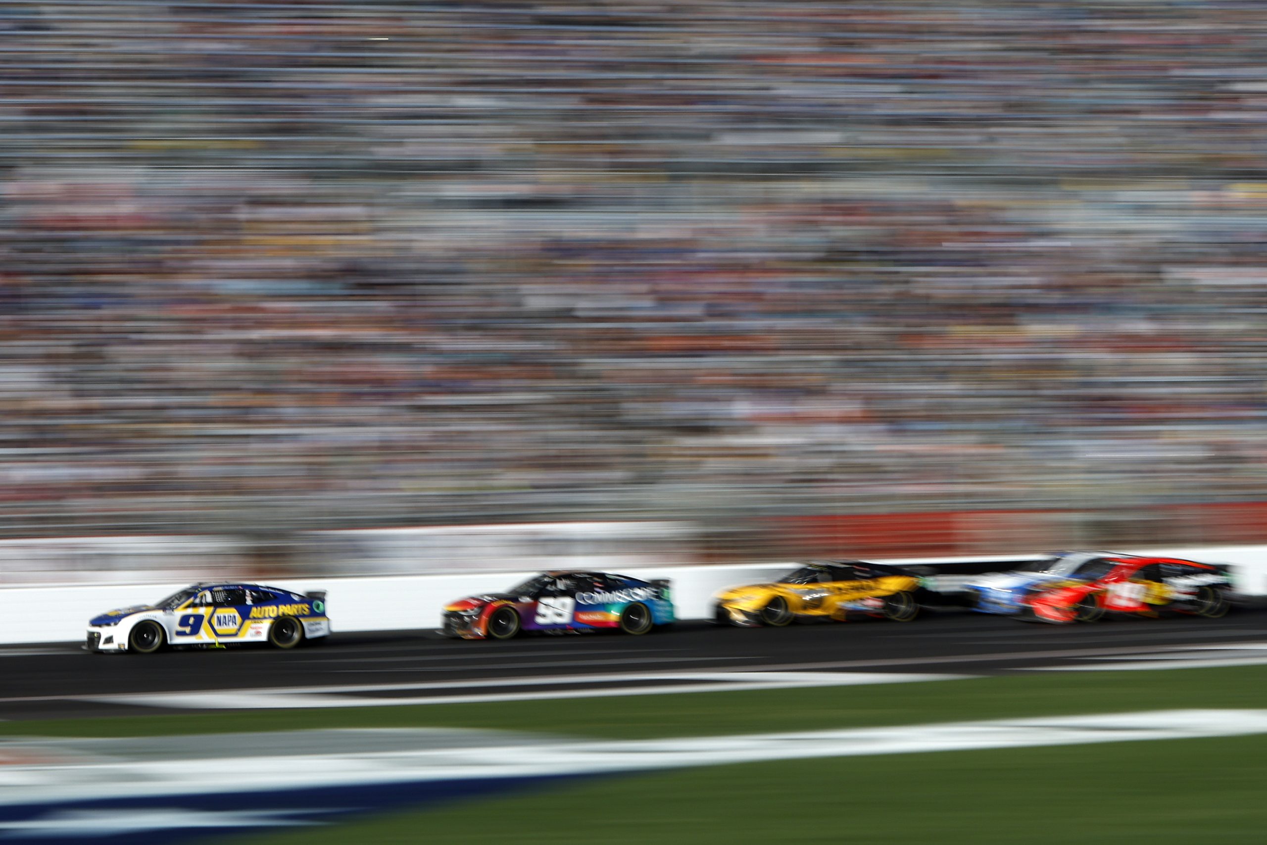 HAMPTON, GEORGIA - MARCH 20: Chase Elliott, driver of the #9 NAPA Auto Parts Chevrolet, leads the field during the NASCAR Cup Series Folds of Honor QuikTrip 500 at Atlanta Motor Speedway on March 20, 2022 in Hampton, Georgia. (Photo by Sean Gardner/Getty Images) | Getty Images