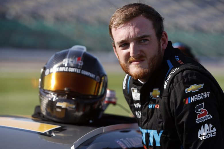 KANSAS CITY, KANSAS - MAY 14: Ty Dillon, driver of the #42 Chevyliners.com Chevrolet, enters his car during qualifying for the NASCAR Cup Series AdventHealth 400 at Kansas Speedway on May 14, 2022 in Kansas City, Kansas. (Photo by Sean Gardner/Getty Images) | Getty Images