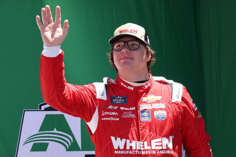 CONCORD, NORTH CAROLINA - MAY 28: Sheldon Creed, driver of the #2 Whelen Chevrolet, waves to fans onstage during driver intros prior to the NASCAR Xfinity Series Alsco Uniforms 300 at Charlotte Motor Speedway on May 28, 2022 in Concord, North Carolina. (Photo by James Gilbert/Getty Images) | Getty Images