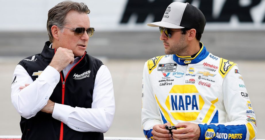 Jeff Gordon (L) and Chase Elliott (R) talk.