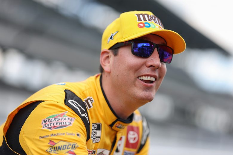 Kyle Busch looks on