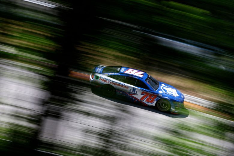 ELKHART LAKE, WISCONSIN - JULY 03: Kyle Tilley, driver of the #78 Patriot Military Family FDN Ford, drives during the NASCAR Cup Series Kwik Trip 250 at Road America on July 03, 2022 in Elkhart Lake, Wisconsin. (Photo by Sean Gardner/Getty Images) | Getty Images