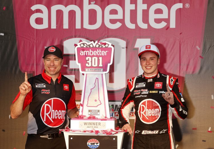 Adam Stevens and Christopher Bell celebrate in Victory Lane