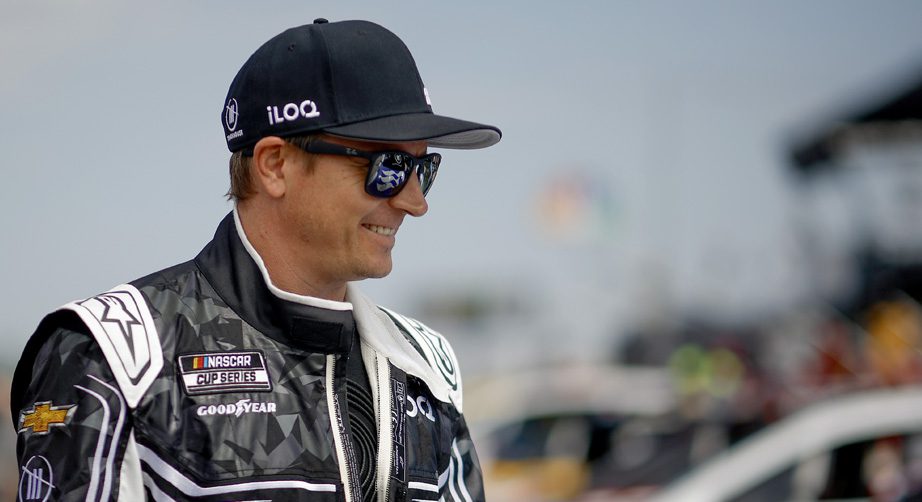 Kimi Räikkönen walks the grid prior to qualifying at Watkins Glen.