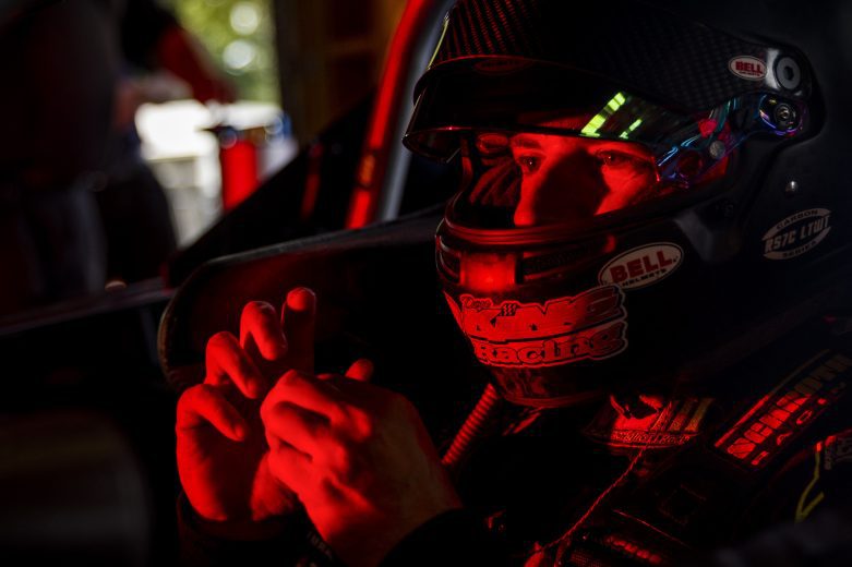 Doug Coby, driver of the #10 Mayhew Tools, looks on during practice for the Phoenix Communications 150 for the Whelen Modified Tour at Thompson Speedway Motorsports Park on August 18, 2022 in Claremont, New Hampshire. (Adam Glanzman/NASCAR)