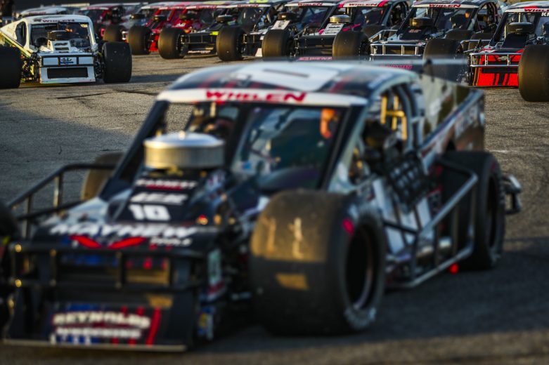 Cars line up during qualifying the Phoenix Communications 150 for the Whelen Modified Tour at Thompson Speedway Motorsports Park on August 18, 2022 in Claremont, New Hampshire. (Adam Glanzman/NASCAR)