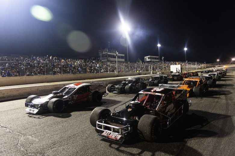 Cars line up on the grid for the Phoenix Communications 150 for the Whelen Modified Tour at Thompson Speedway Motorsports Park on August 18, 2022 in Claremont, New Hampshire. (Adam Glanzman/NASCAR)