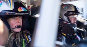 Kolby Garrison sits as a passenger in the NBC Sports Toyota alongside Jeff Burton