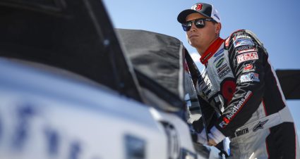 Zane Smith waits by his truck.