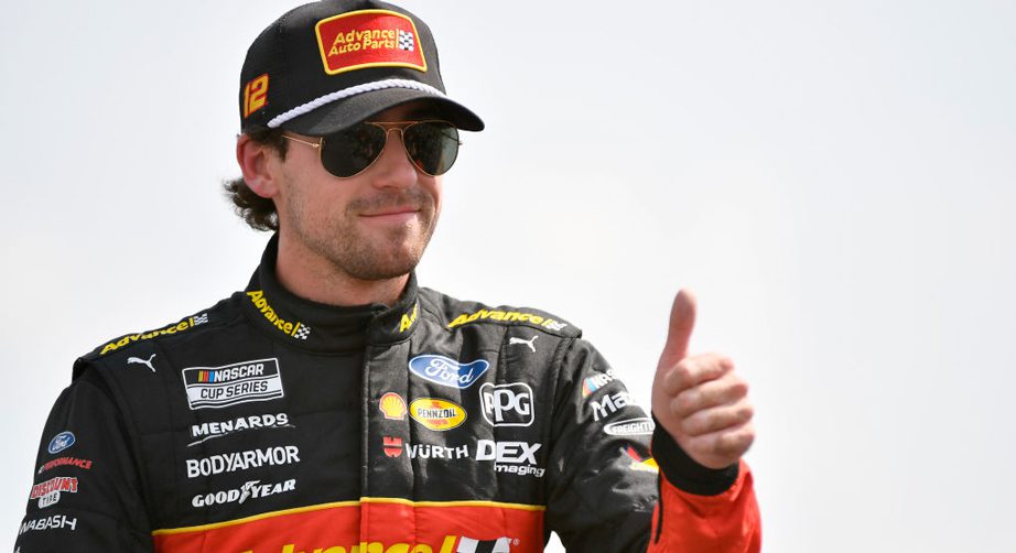 Ryan Blaney gives thumbs up while wearing Advance Auto Parts firesuit