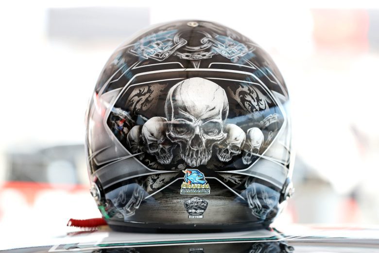 The helmet of Justin Bonsignore, driver of the #51 Phoenix Communications, Inc. Modified during the CheckeredFlag.com 150 for the NASCAR Whelen Modified Tour at Larry King Law's Langley Speedway on August 27, 2022 in Hampton, Virginia. (Ryan M. Kelly/NASCAR)