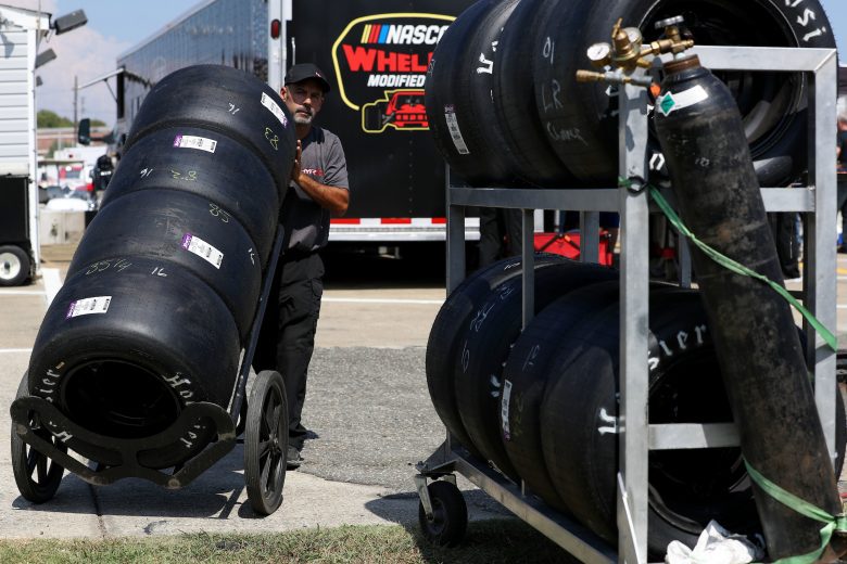 Tires are delivered during the CheckeredFlag.com 150 for the NASCAR Whelen Modified Tour at Larry King Law's Langley Speedway on August 27, 2022 in Hampton, Virginia. (Ryan M. Kelly/NASCAR)