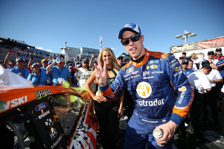 LAS VEGAS, NV - SEPTEMBER 16: Brad Keselowski, driver of the #2 Autotrader Ford, celebrates in victory lane by placing the Winner's Sticker on his car after winning the Monster Energy NASCAR Cup Series SouthPoint 400 at Las Vegas Motor Speedway on September 16, 2018 in Las Vegas, Nevada. (Photo by Matt Sullivan/Getty Images) | Getty Images