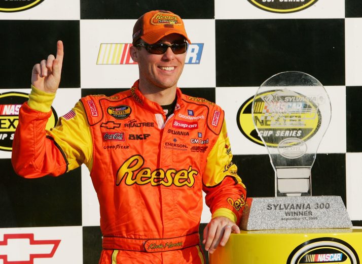 LOUDON, NH - SEPTEMBER 17: Kevin Harvick, driver of the #29 Reese's Chevvrolet, stands with the winners trophy in victory lane, following the NASCAR Nextel Cup Series Sylvania 300 on September 17, 2006 at New Hampshire International Speedway in Loudon, New Hampshire. (Photo by Jim McIsaac/Getty Images) | Getty Images