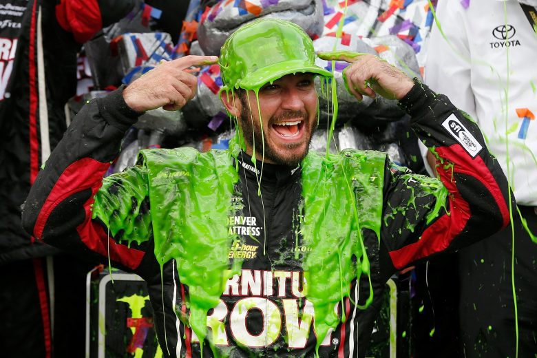 JOLIET, IL - SEPTEMBER 17: Martin Truex Jr., driver of the #78 Furniture Row/Denver Mattress Toyota, celebrates in victory lane after winning during the Monster Energy NASCAR Cup Series Tales of the Turtles 400 at Chicagoland Speedway on September 17, 2017 in Joliet, Illinois. (Photo by Brian Lawdermilk/Getty Images) | Getty Images