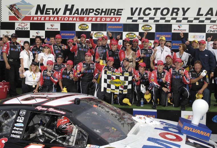 LOUDON, NH - SEPTEMBER 18: Ryan Newman, driver of the #12 Mobil Dodge, celebrates winning the NASCAR Nextel Cup Series Sylvania 300 on September 18, 2005 at the New Hampshire International Speedway in Loudon, New Hampshire. (Photo by Rusty Jarrett/Getty Images) | Getty Images
