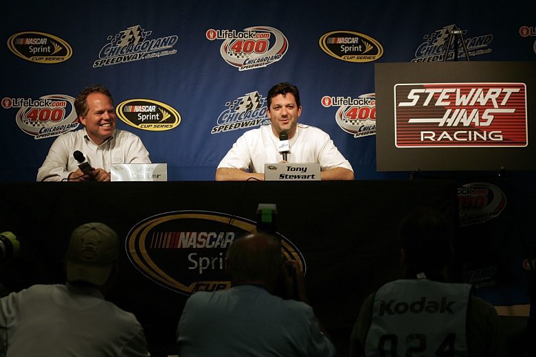 JOLIET, IL - JULY 10: Joe Custer (L), General Manager for Haas Racing and Tony Stewart (R), driver of the #20 Home Depot Toyota, announce during a press conference, that Tony will become part owner and full time driver for the new Stewart Haas Racing team in 2009, prior to practice for the NASCAR Sprint Cup Series LifeLock.com 400 on July 10, 2008 at Chicagoland Speedway in Joliet, Illinois. (Photo by Jason Smith/Getty Images for NASCAR) | Getty Images