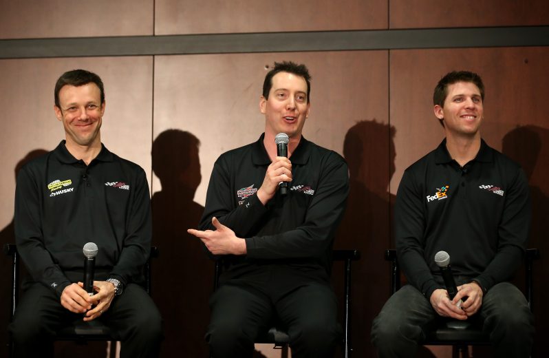 CONCORD, NC - JANUARY 24: (L-R) Matt Kenseth, Kyle Busch and Denny Hamlin drivers for Joe Gibbs Racing speak to the media during the 2013 NASCAR Sprint Media Tour on January 24, 2013 in Concord, North Carolina. (Photo by Streeter Lecka/Getty Images for NASCAR) | Getty Images