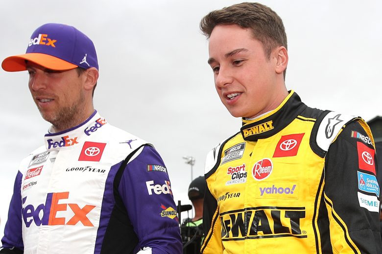 SONOMA, CALIFORNIA - JUNE 12: Denny Hamlin, driver of the #11 FedEx Freight Toyota, (L) and Christopher Bell, driver of the #20 DeWalt Toyota, walk the red carpet prior to the NASCAR Cup Series Toyota/Save Mart 350 at Sonoma Raceway on June 12, 2022 in Sonoma, California. (Photo by Sean Gardner/Getty Images) | Getty Images