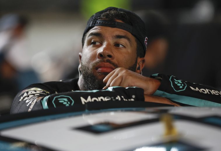 BRISTOL, TENNESSEE - SEPTEMBER 17: Bubba Wallace, driver of the #45 MoneyLion Toyota, looks on in the garage area after mechanical issue during the NASCAR Cup Series Bass Pro Shops Night Race at Bristol Motor Speedway on September 17, 2022 in Bristol, Tennessee. (Photo by Sean Gardner/Getty Images) | Getty Images