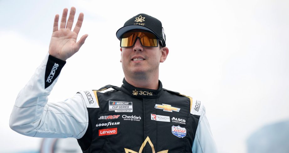 Kyle Busch waves to the crowd