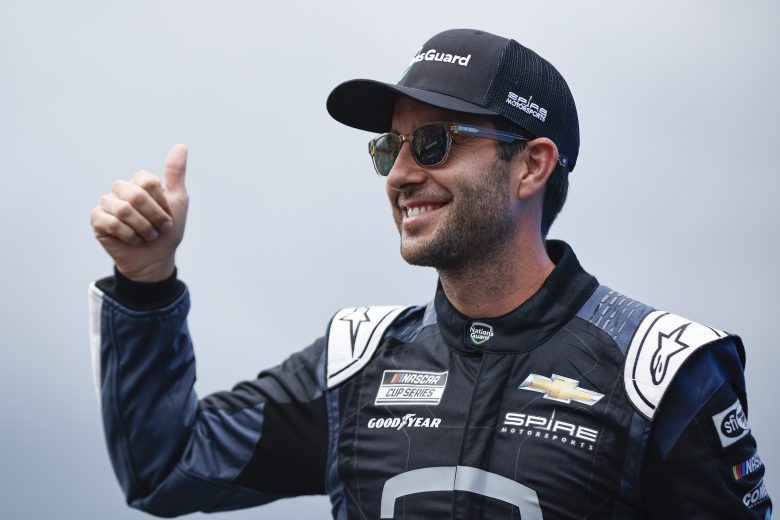 Mike Rockenfeller smiles and gives a thumbs up during driver intros at Watkins Glen