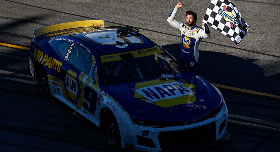 Chase Elliott celebrates with the checkered flag at Talladega Superspeedway