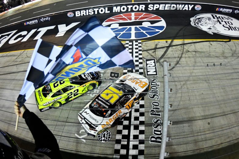 BRISTOL, TENNESSEE - SEPTEMBER 17: AJ Allmendinger, driver of the #16 Barger Precast Chevrolet, spins across the finish line after an incident with Austin Cindric, driver of the #22 Menards/Richmond Ford, to win the NASCAR Xfinity Series Food City 300 at Bristol Motor Speedway on September 17, 2021 in Bristol, Tennessee. (Photo by Logan Riely/Getty Images) | Getty Images