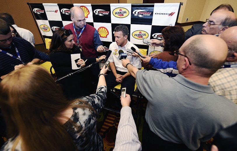 CONCORD, NC - JANUARY 26: A.J. Allmendinger, driver of the #22 Shell/Pennzoil Dodge, speaks with the media during the 2012 NASCAR Sprint Cup Series Media Tour hosted by Charlotte Motor Speedway on January 26, 2012 in Concord, North Carolina. (Photo by Jared C. Tilton/Getty Images for NASCAR) | Getty Images