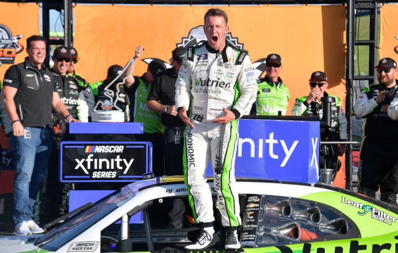 AJ Allmendinger celebrates in Victory Lane