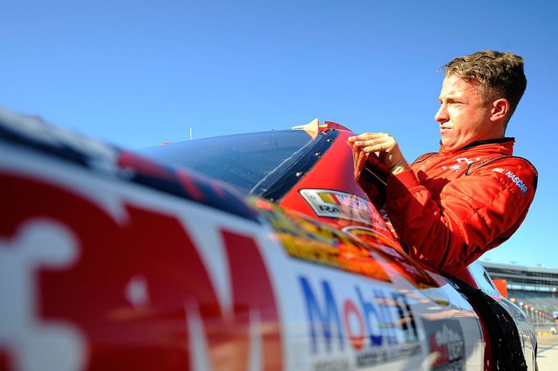 Allmendinger climbs in his car