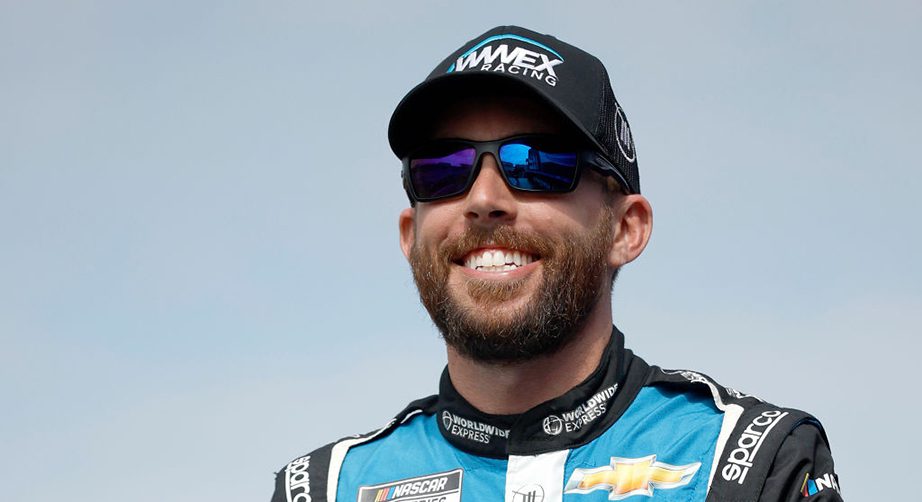 CONCORD, NORTH CAROLINA - OCTOBER 09: Ross Chastain, driver of the #1 Worldwide Express Chevrolet, walks onstage during driver intros prior to the NASCAR Cup Series Bank of America Roval 400 at Charlotte Motor Speedway on October 09, 2022 in Concord, North Carolina. (Photo by Jared C. Tilton/Getty Images) | Getty Images